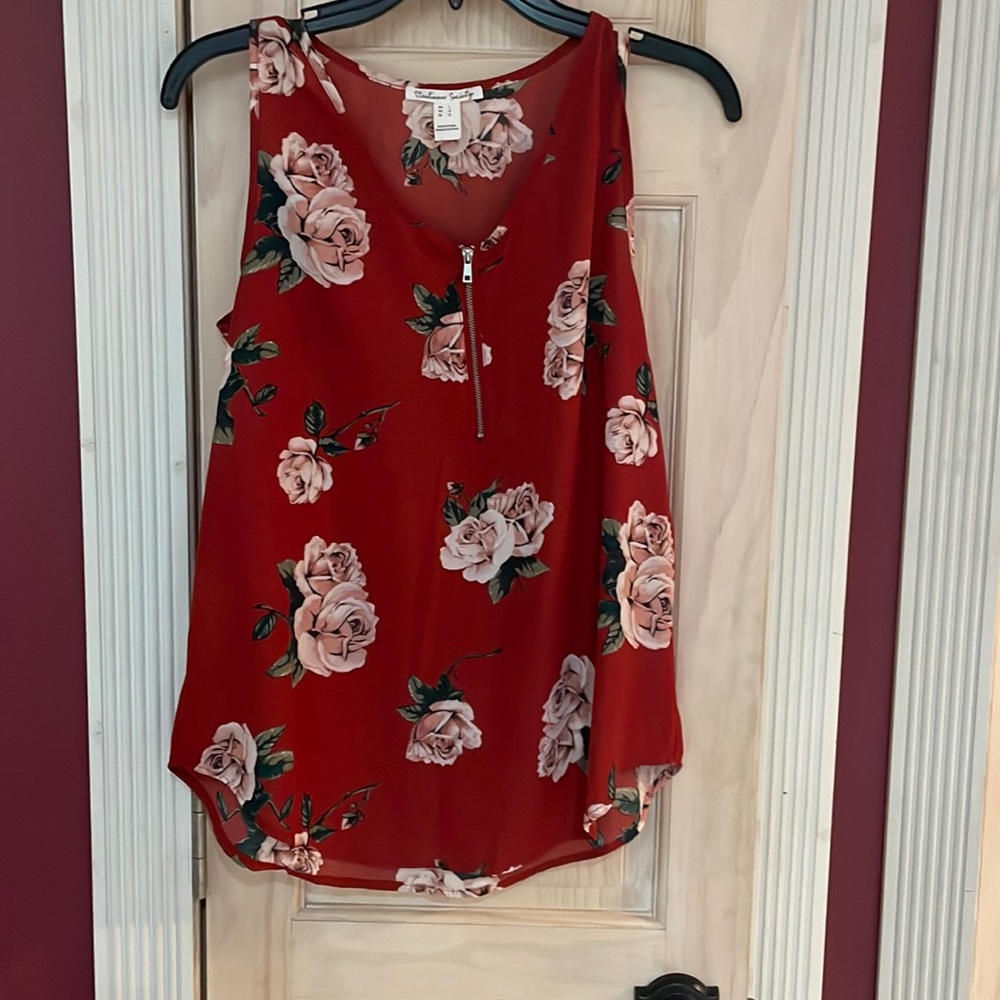 Orange floral blouse